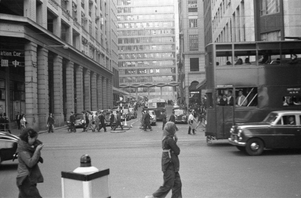 35A-16a Image of traffic, a pedestrian crossing and a double-decker tram in Hong Kong