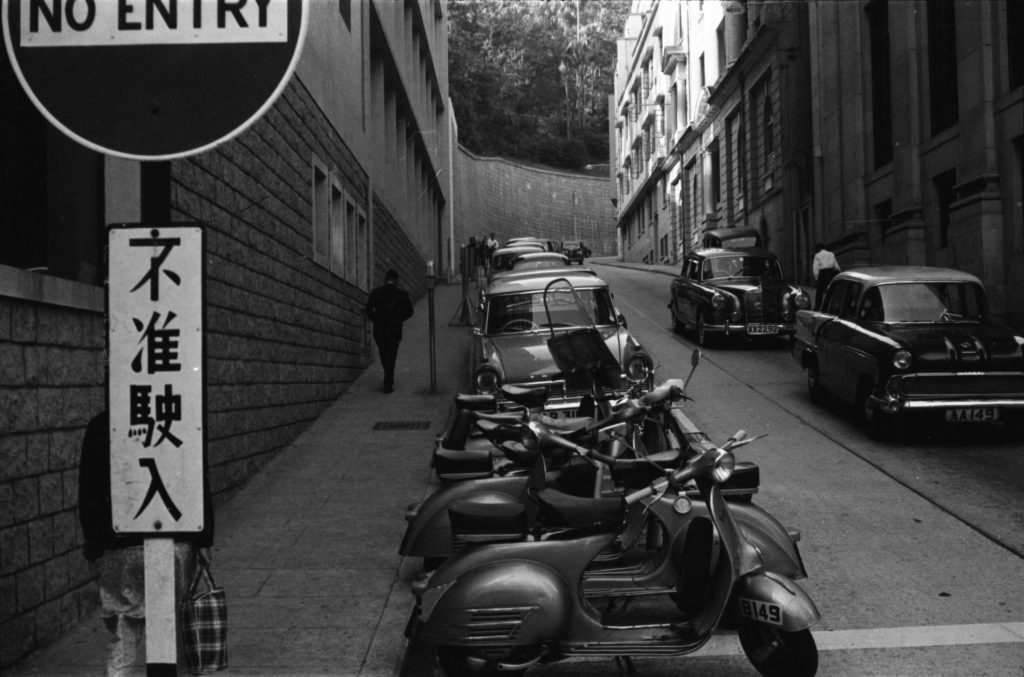 35A-17b Image of parked cars and motorcycles in Hong Kong