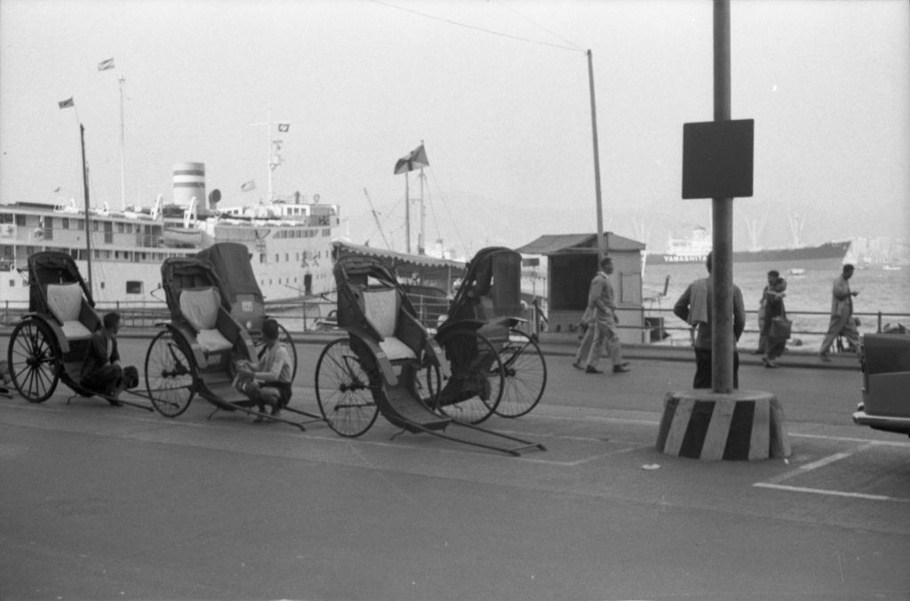 35A-18c Image of parked rickshaws in Hong Kong