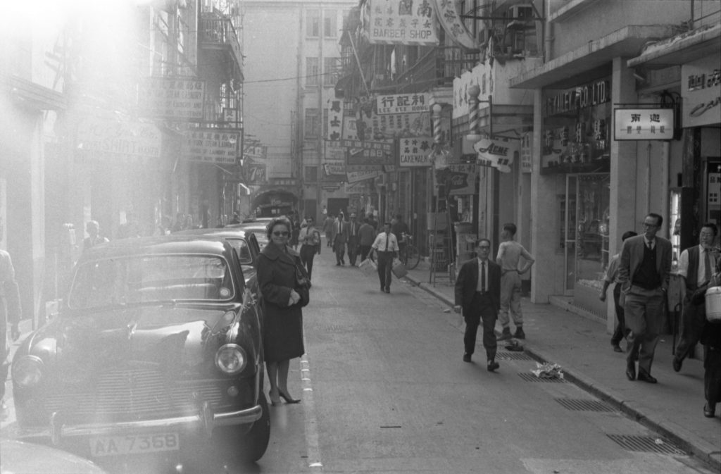 35A-21a Image of pedestrian traffic and parked cars in Hong Kong