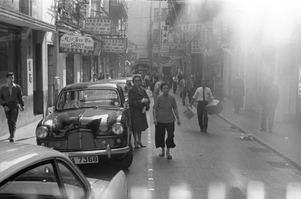 35A-21b Image of pedestrian traffic and parked cars in Hong Kong