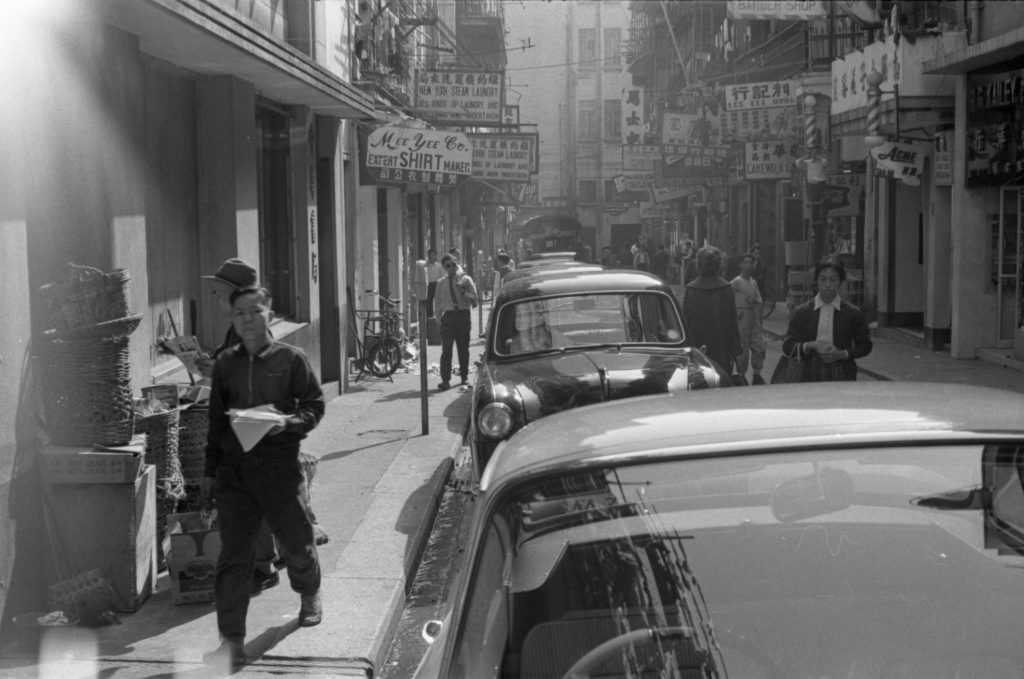 35A-21c Image of pedestrian traffic and parked cars in Hong Kong