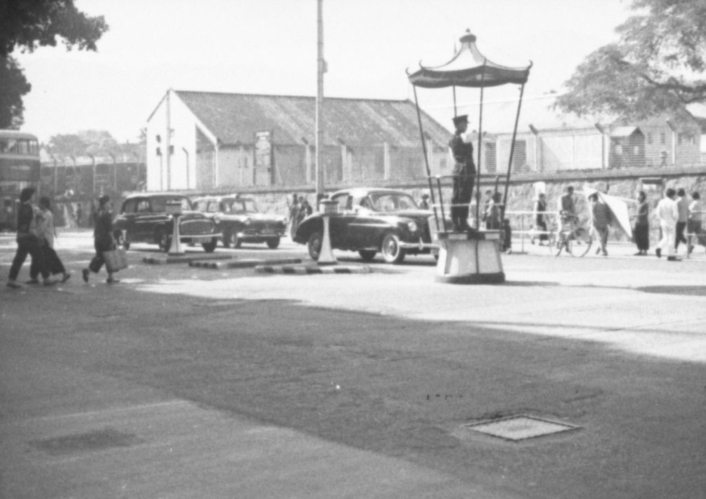 35A-30c Image of a pedestrian crossing and traffic controller in Hong Kong