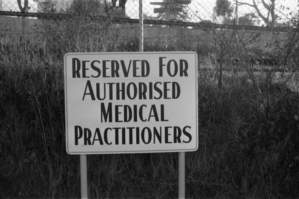 35A-33e Image of a sign marked “Reserved for authorised medical practitioners”