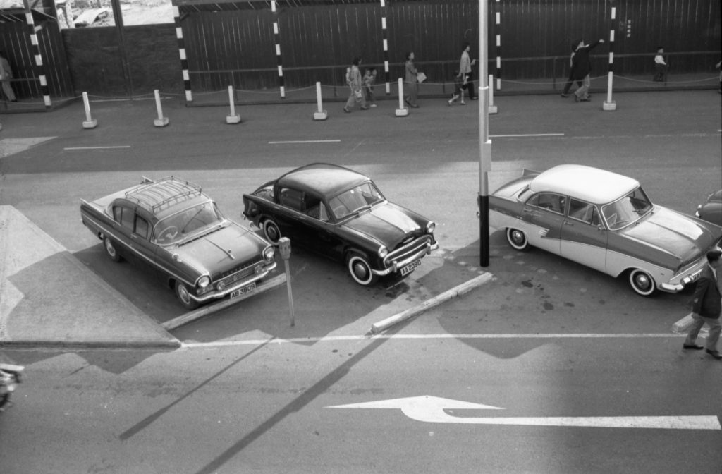 35A-38a Image showing angled parking in the centre of a road in Hong Kong