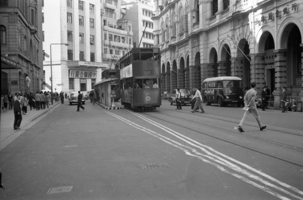 35A-39a Image of a double-decker tram and tram stop in Hong Kong