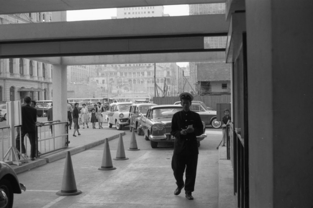 35A-43b Image showing a queue of cars, possibly entering a car park in Hong Kong