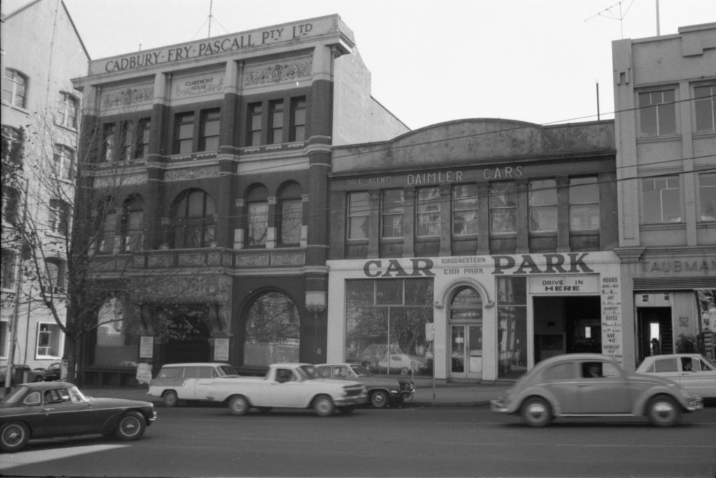 35A-45a Image of a street with passing traffic, Cadbury Fry Pascal Pty. Ltd. offices and Kingwestern car park visible