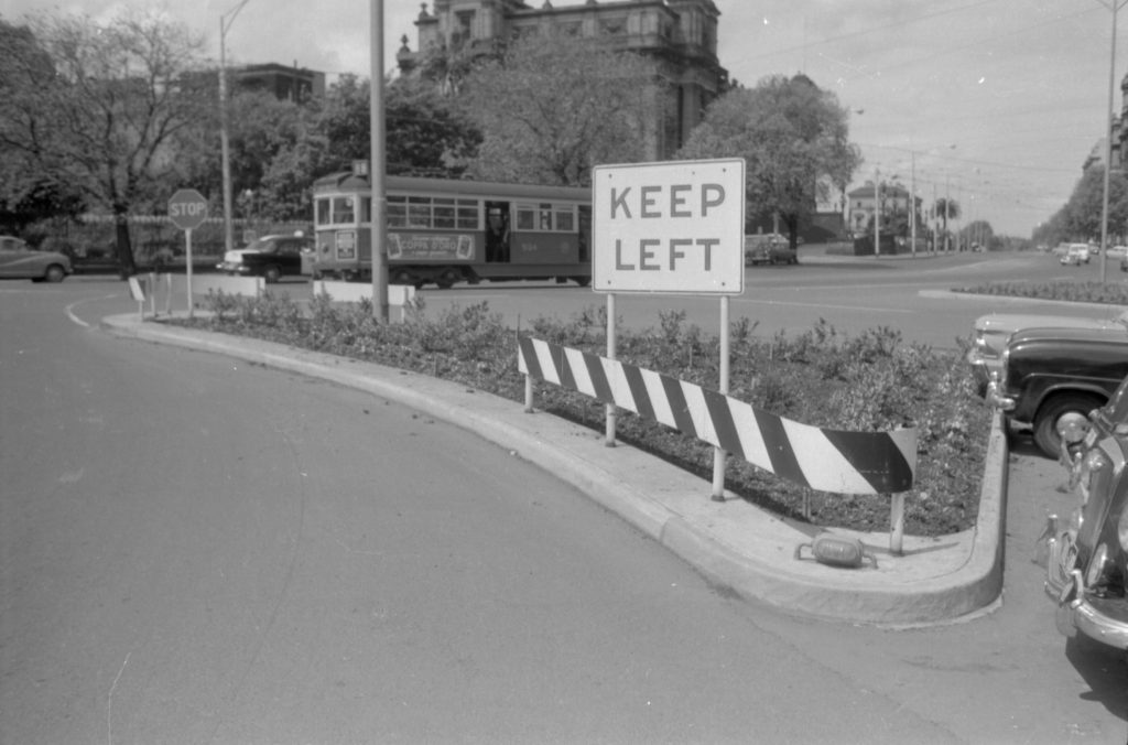 35A-48b Image of a traffic island with a “keep left” sign, corner Spring Street and Little Bourke Street