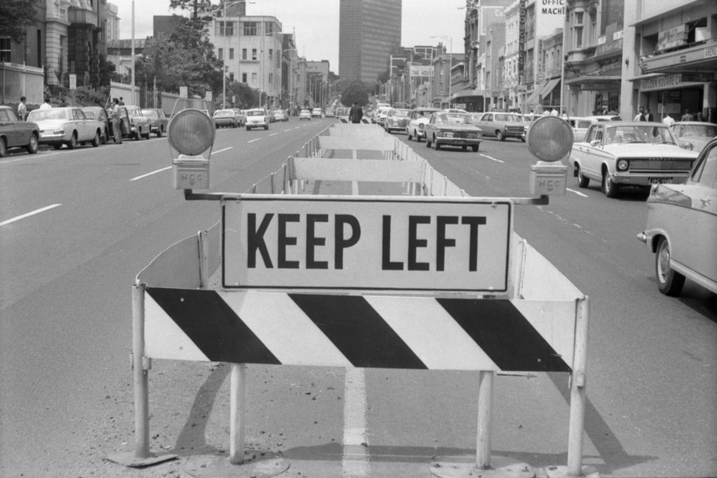 35A-54c Image of median strip barriers and a keep left sign, looking north-east up Lonsdale Street