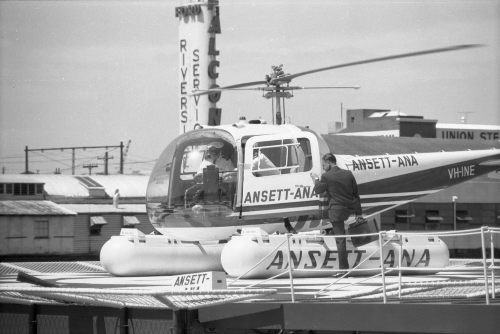 35A-79c Image showing a helicopter landing on a helipad