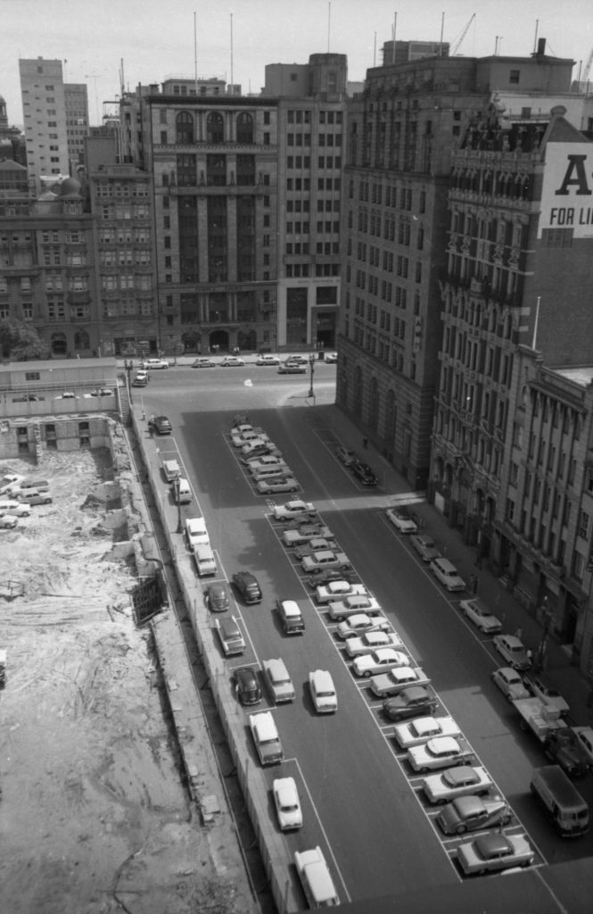 35A-92b Image showing cars parked next to the site of the Western Market, after the building’s demolition