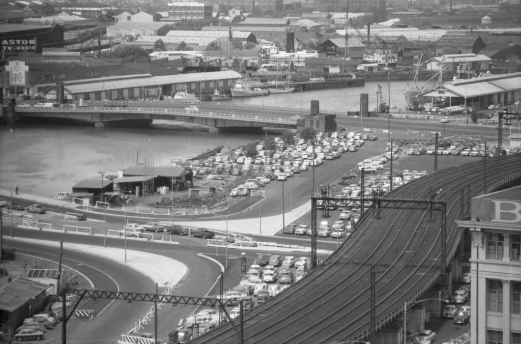 35A-94a Image of the Yarra River, with Spencer Street bridge, King Street bridge, a car park and train tracks in view