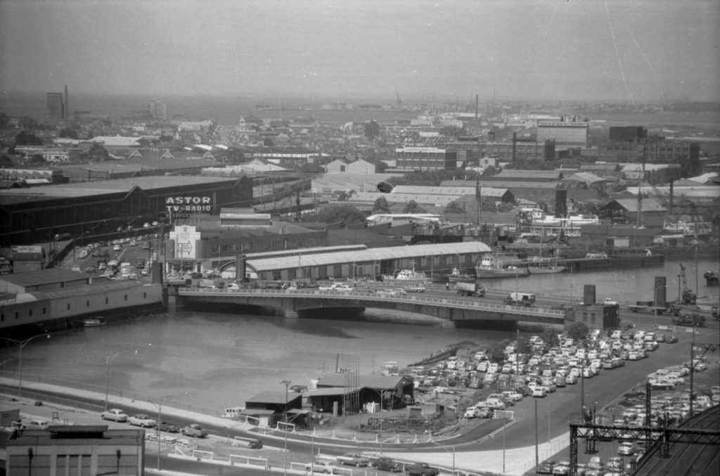 35A-94c Image of the Yarra River, with Spencer Street bridge, King Street bridge, a car park and train tracks in view