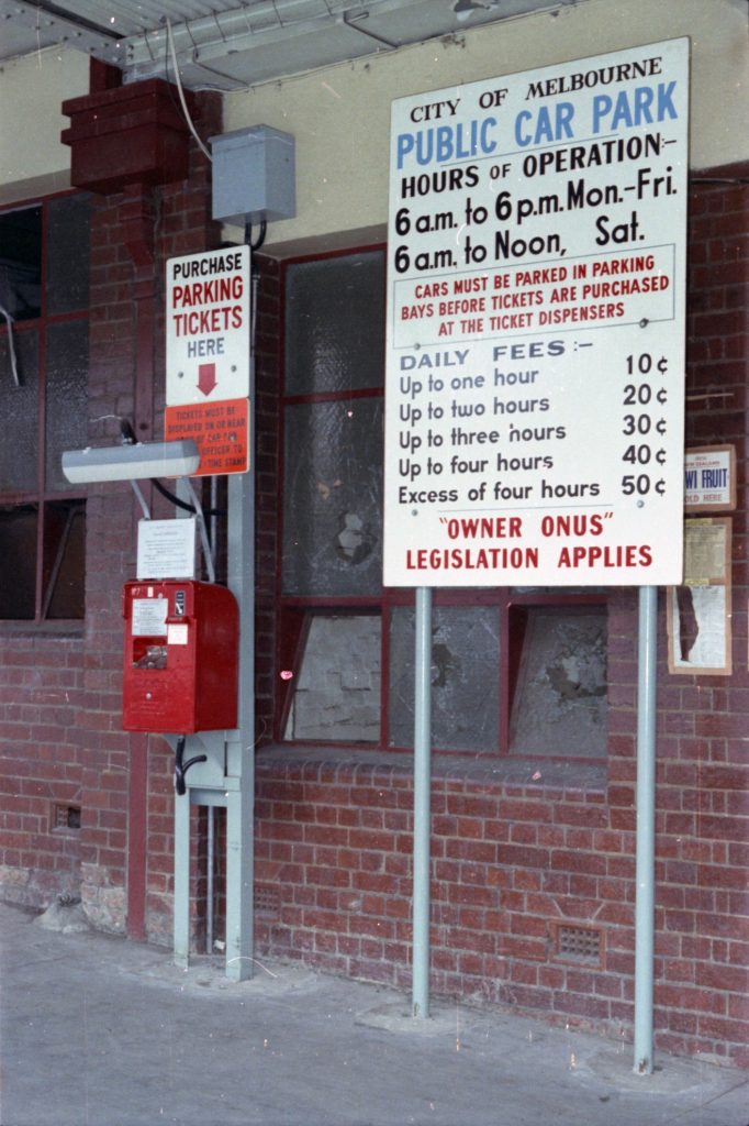 35B-2c Image of a sign for a City of Melbourne public car park, and a ticket dispensing machine