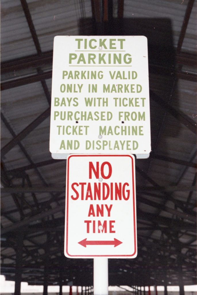 35B-3c Image of signs for ticket parking and “no standing”