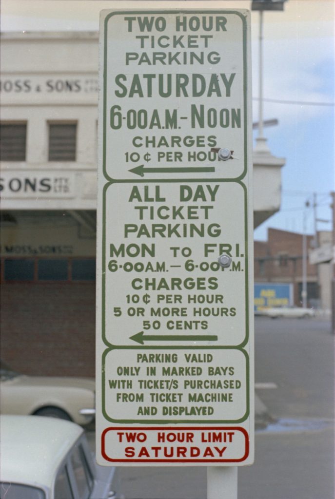 35B-7a Image of a parking sign at Queen Victoria Market, with details describing rates for different time periods