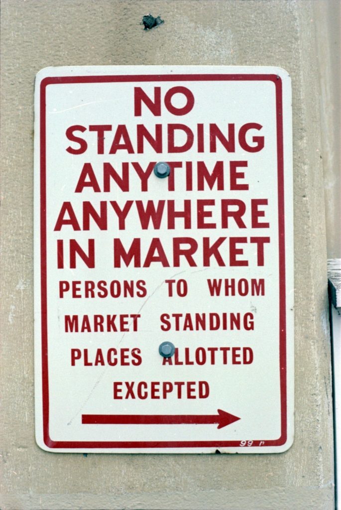 35B-7b Image of a sign indicating “no standing anytime anywhere in market”