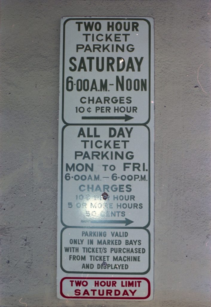 35B-10a Image of a parking sign, with details describing rates for different time periods