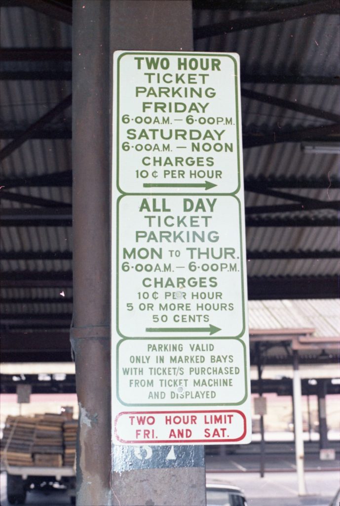 35B-10d Image of a parking sign at Queen Victoria Market carpark, with details describing rates for different time periods