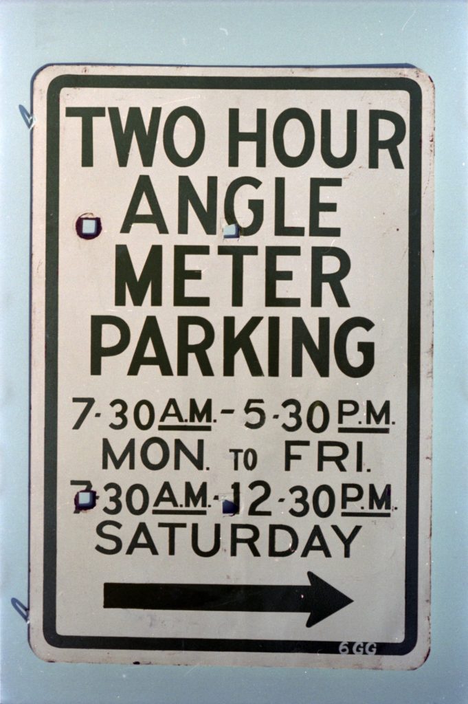 35B-55c Image of a sign for two hour angle meter parking