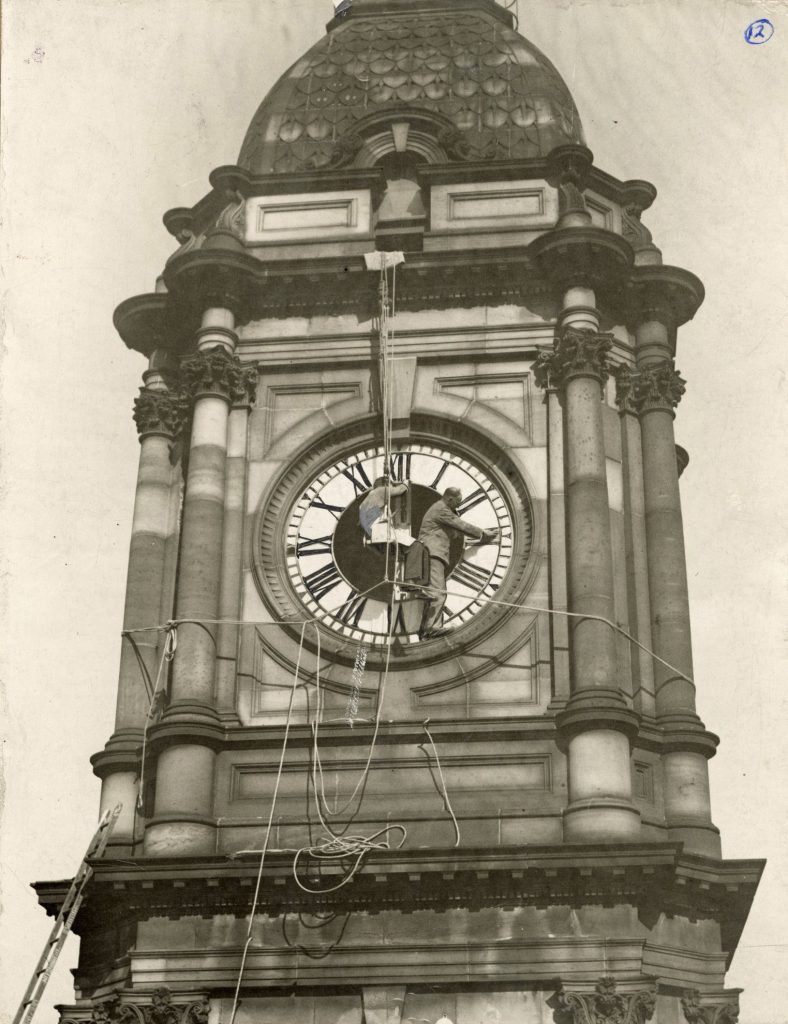 Image showing installation or maintenance of Melbourne Town Hall’s clock