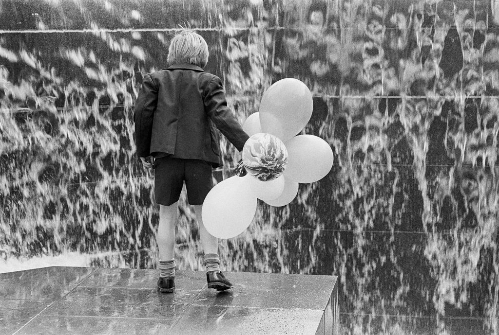 Schoolboy in City Square