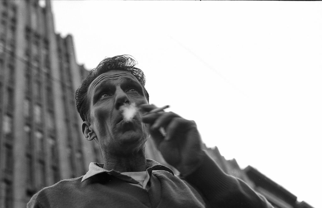 Man smoking in Collins Street (Vietnam moratorium protest)